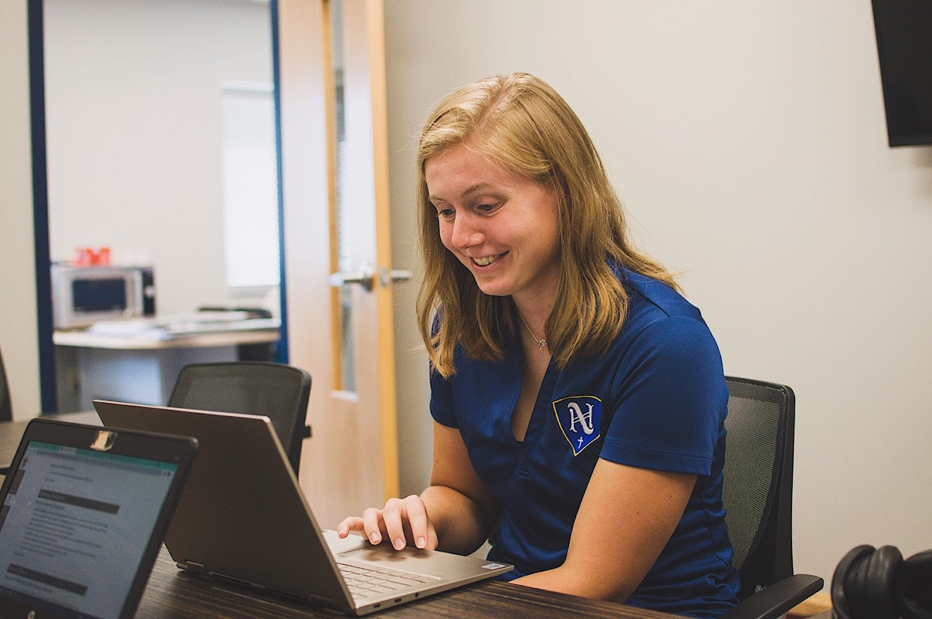 A high school student works on her CCP class at school.